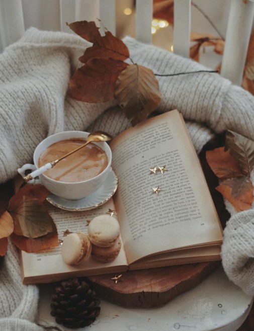 Book and coffee in the fall.
